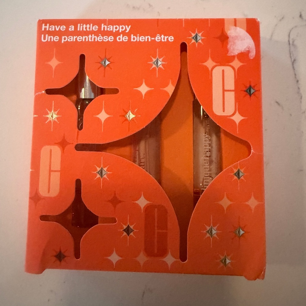 Clinique Fragrance Collection in Bright Orange Packaging .17 oz each (3 in pack)